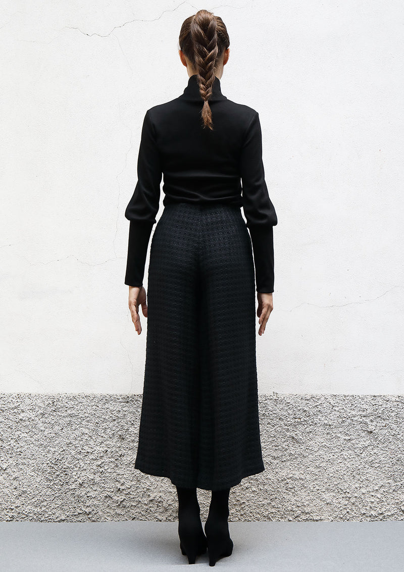 Flared cropped wool trousers